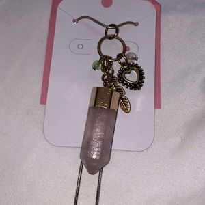 Pink crystal necklace with charms